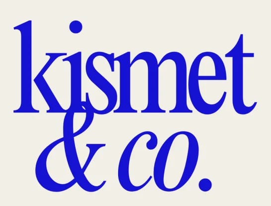 Kismet and Co Events logo in blue serif font with decorative ampersand